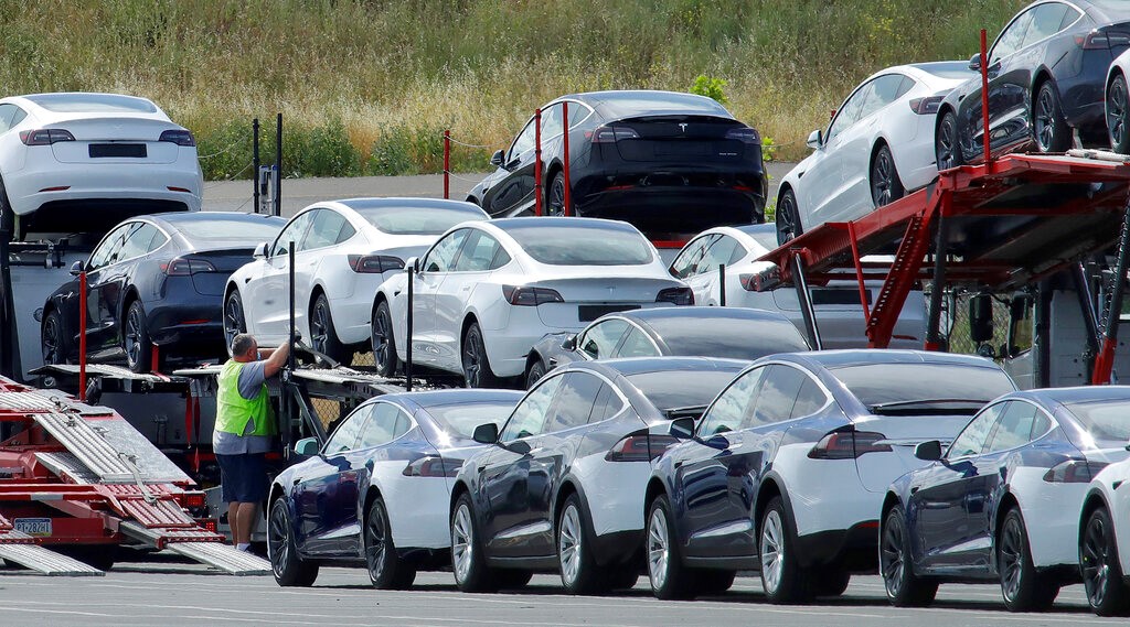 Tesla is in short supply and its production cannot keep up with global sales.  (AP Image)