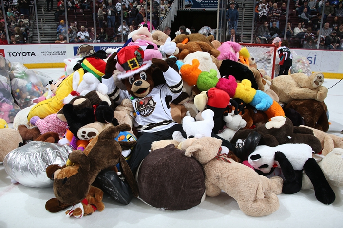 teddy bears thrown on ice