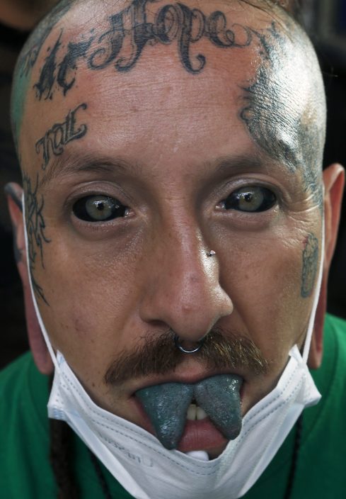 AP Photos: In Mexico, prejudice fades around tattoos