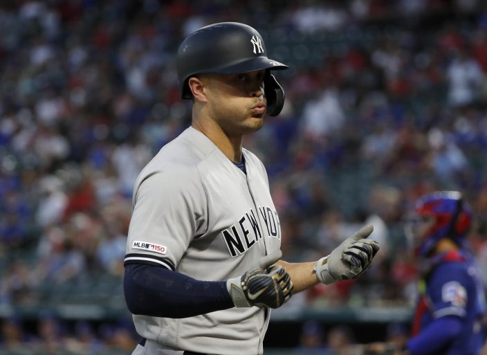 New York Yankees starting pitcher Corey Kluber walks to the dugout after  working against the Texas Rangers in the seventh inning of a baseball game  in Arlington, Texas, Wednesday, May 19, 2021. (