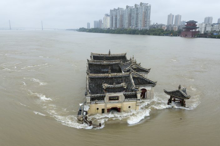 Breached levees trap thousands as flooding in China worsens | News