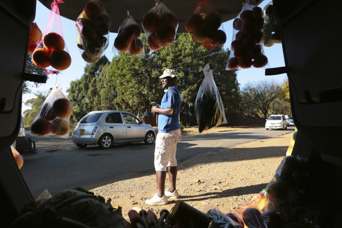 Many Zimbabweans sell goods from their cars in hard times
