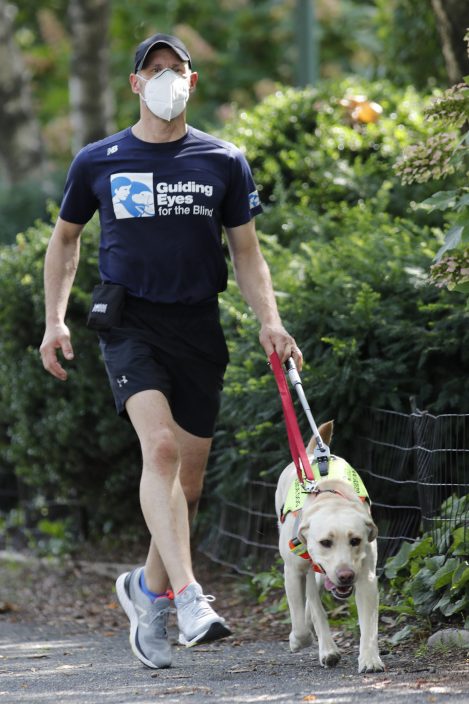 Guide dogs helping blind runners stay fit despite pandemic