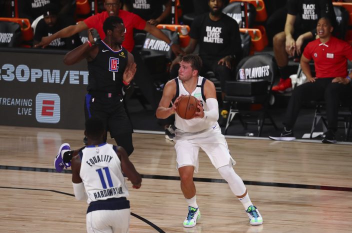 Clippers hold off Doncic, Mavs after Porzingis is tossed | Sport ...