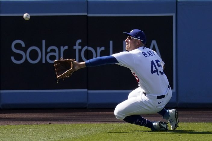 Los Angeles Dodgers Matt Beaty (45) celebrates with Zach McKinstry