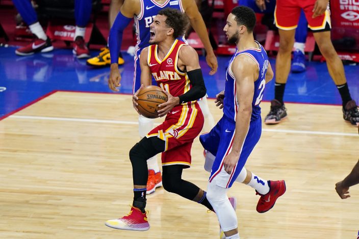 DeVonta Smith and Jalen Hurts sit courtside for Sixers vs. Hawks