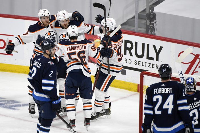 Jets storm back from 3-goal deficit, top Oilers 5-4 in OT