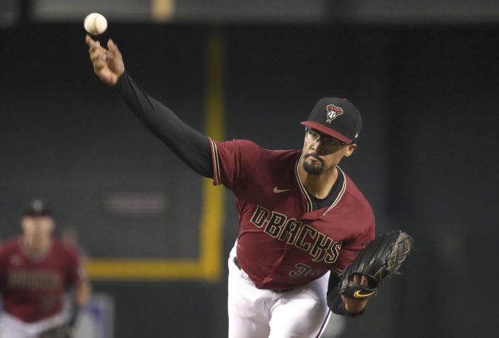 Ohtani delivers on mound, at plate as Angels top D-backs 6-5