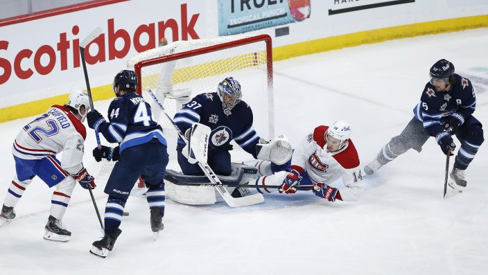 Canadiens' Game 1 win tempered by late hit on Jake Evans