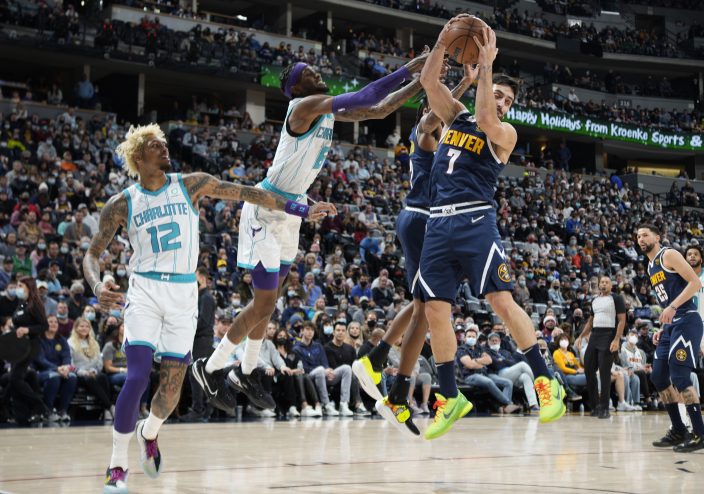 Porter, Dozier lead Nuggets to 100-86 win over Hornets