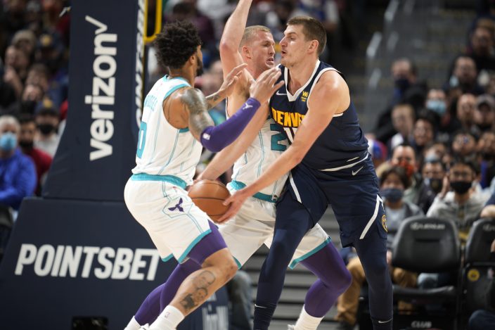 Porter, Dozier lead Nuggets to 100-86 win over Hornets