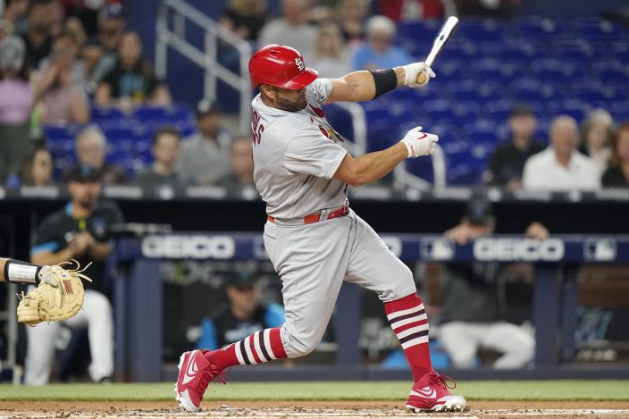 Pujols paces Cardinals, helps Wainwright in win over Marlins