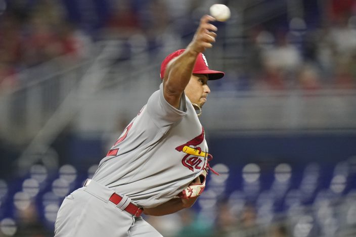 Pujols paces Cardinals, helps Wainwright in win over Marlins